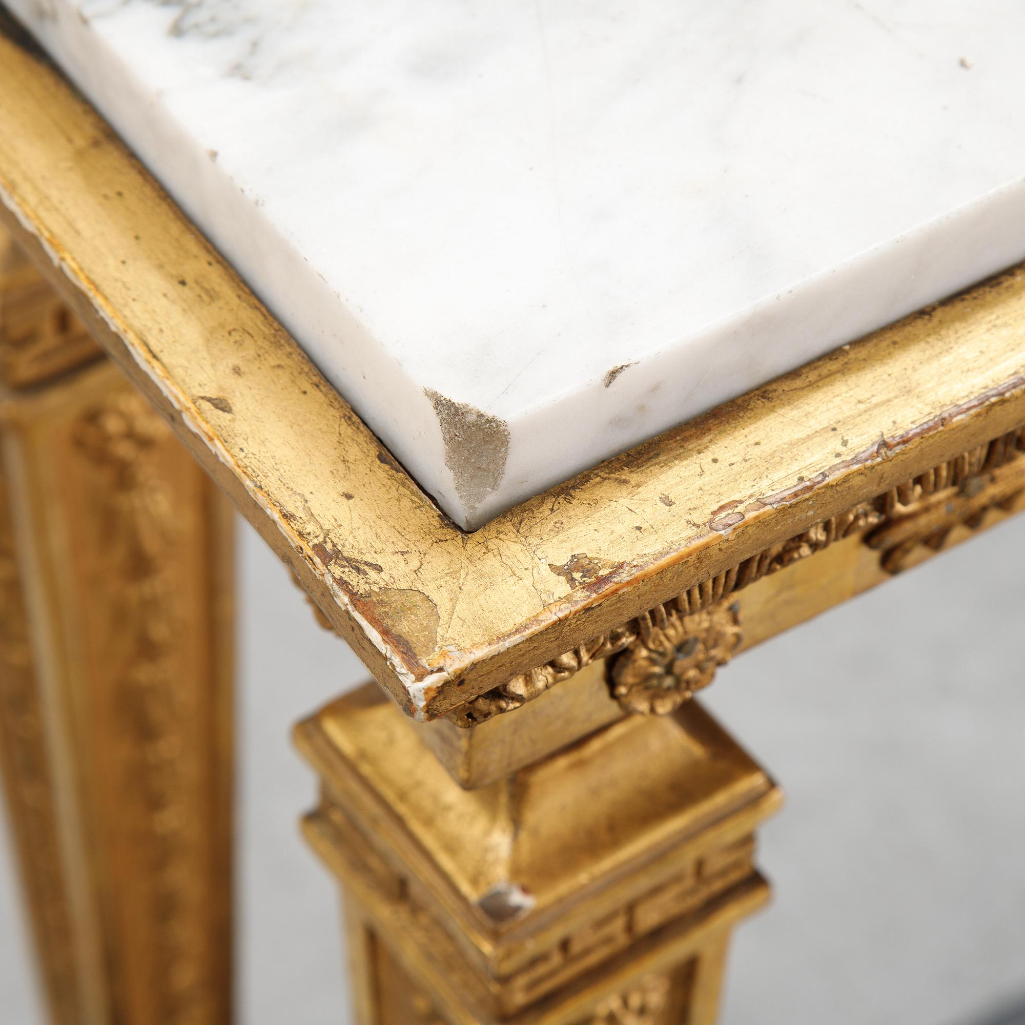 An early 19th Century console table.