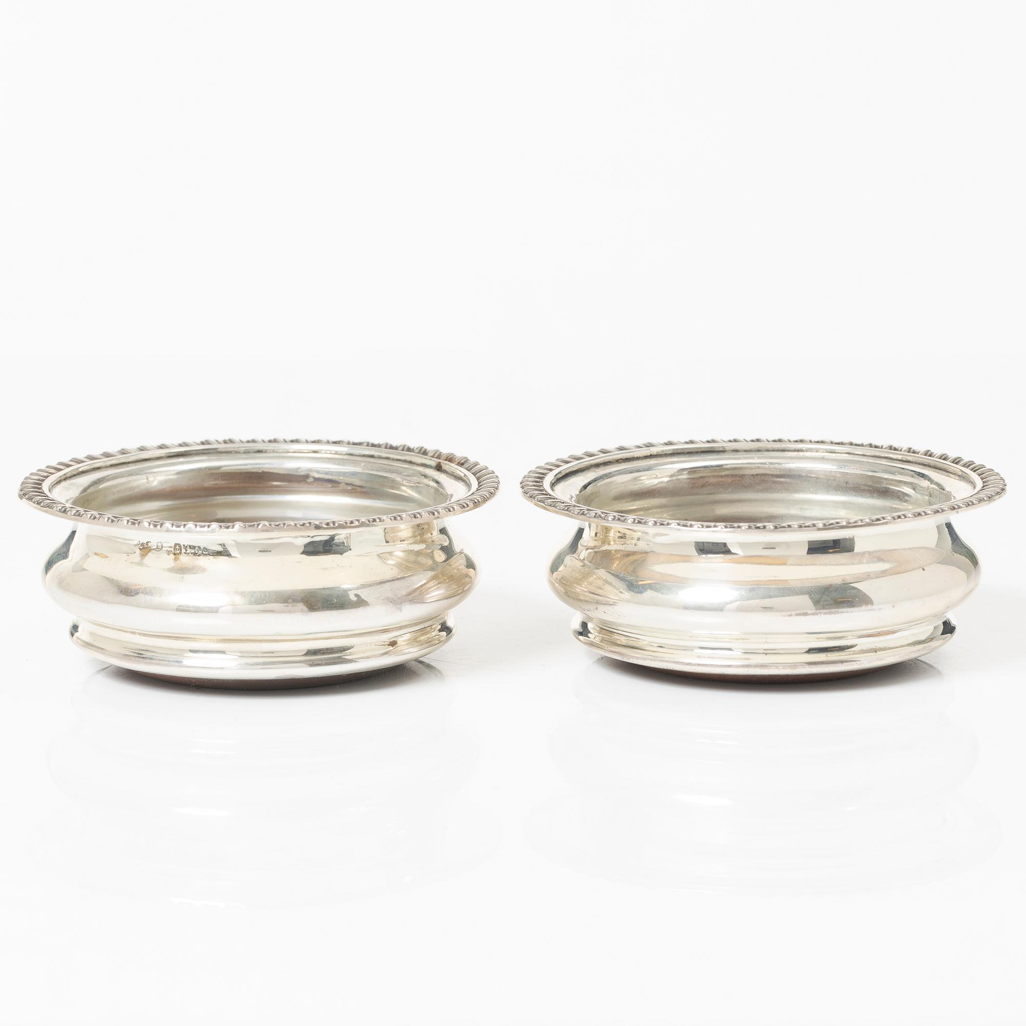 Coasters, a pair, silver, Birmingham, England, and shakers, a pair, silver, Norway.