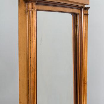 An Empire style mirror with console table, 19th century, probably Finland.