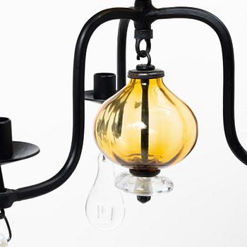 Erik Höglund, a chandelier and a candlestick, Boda Smide.