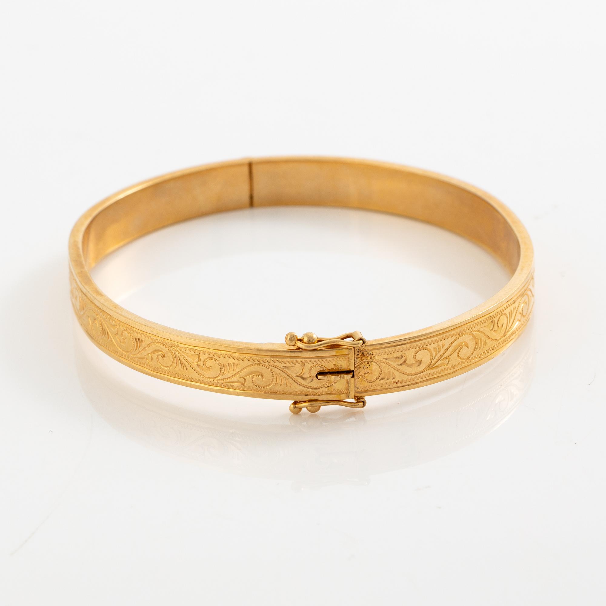 Arm ring, 18K gold.