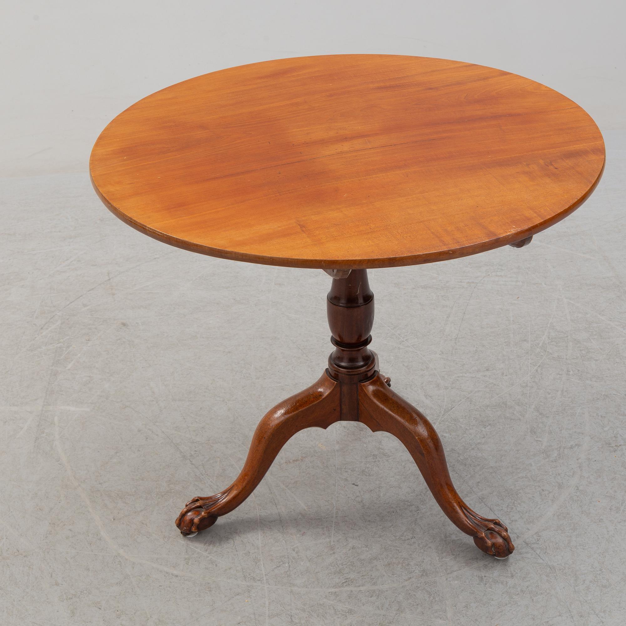 An 18th Century mahogany table.