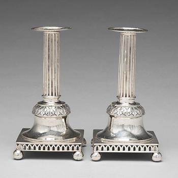 267. A pair of Swedish aerly 19th century silver candlesticks, mark of Carl Gustaf Blomborg, Stockholm 1815.