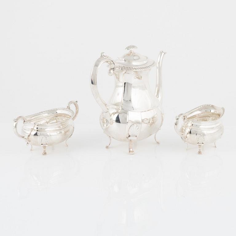 A Norwegian Silver Coffee Pot, Creamer and Sugar Bowl, mark of David Andersen, Oslo, mid-20th Century.