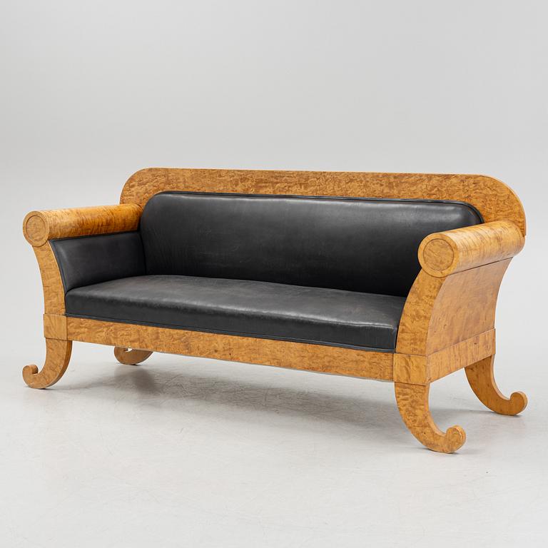 An Empire sofa, first half of the 19th century.