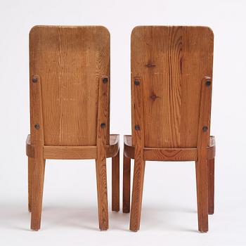 Axel Einar Hjorth, a pair of stained pine 'Lovö' chairs, Nordiska Kompaniet, Sweden 1930s.