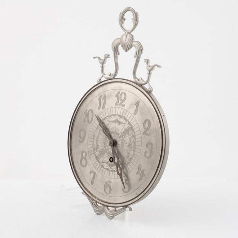 Nils Fougstedt, a pewter and brass wall clock, Svenskt Tenn, Stockholm 1935, model A 618.