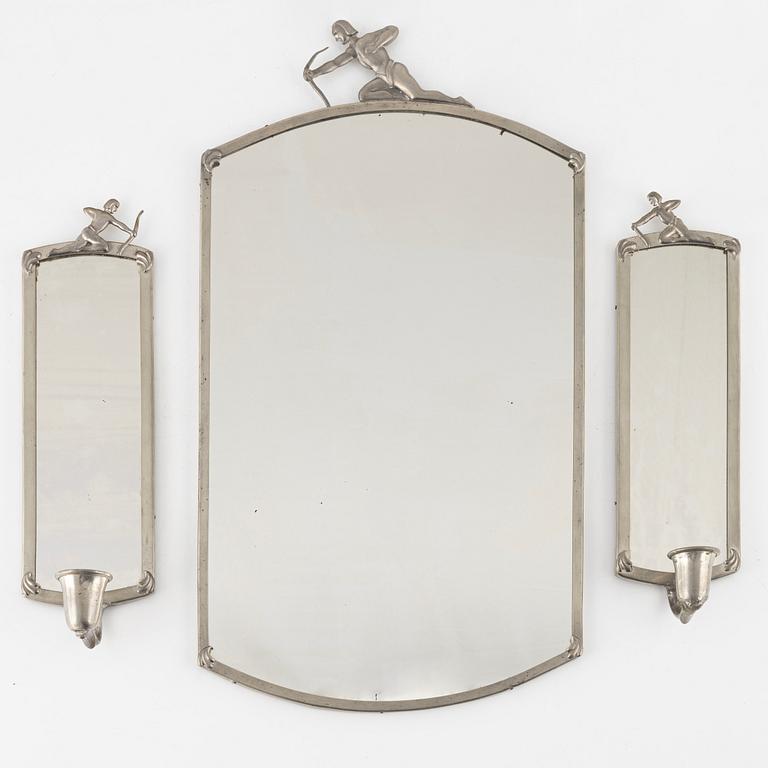 A pewter mirror with two sconces, first part of the 20th Century.