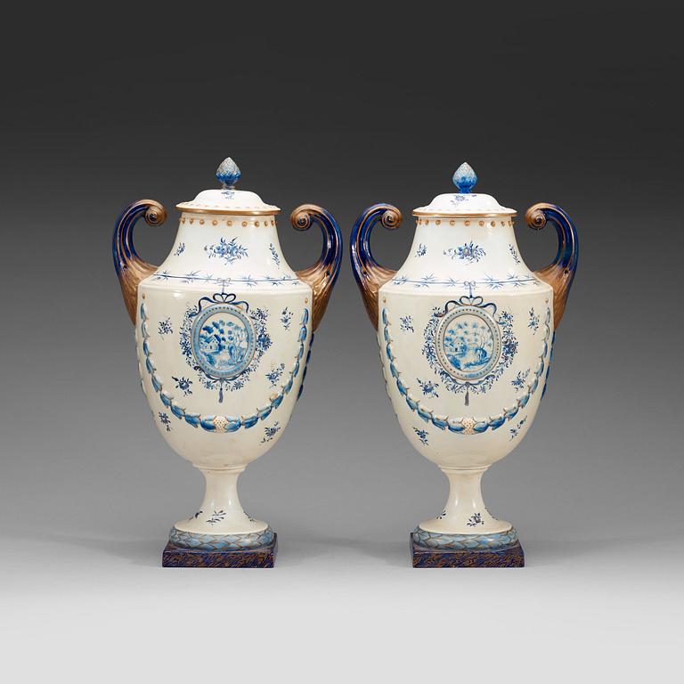 A pair of 'Marieberg shaped' jars with covers, Qing dynasty, Jiaqing (1796-1820).