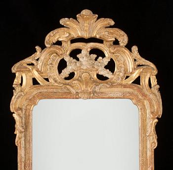 A Swedish Rococo 18th century mirror by J Åkerblad, master 1758.