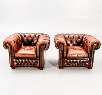 Fåtöljer ett par Chesterfield-stil 1990-tal Britannia-möbler.