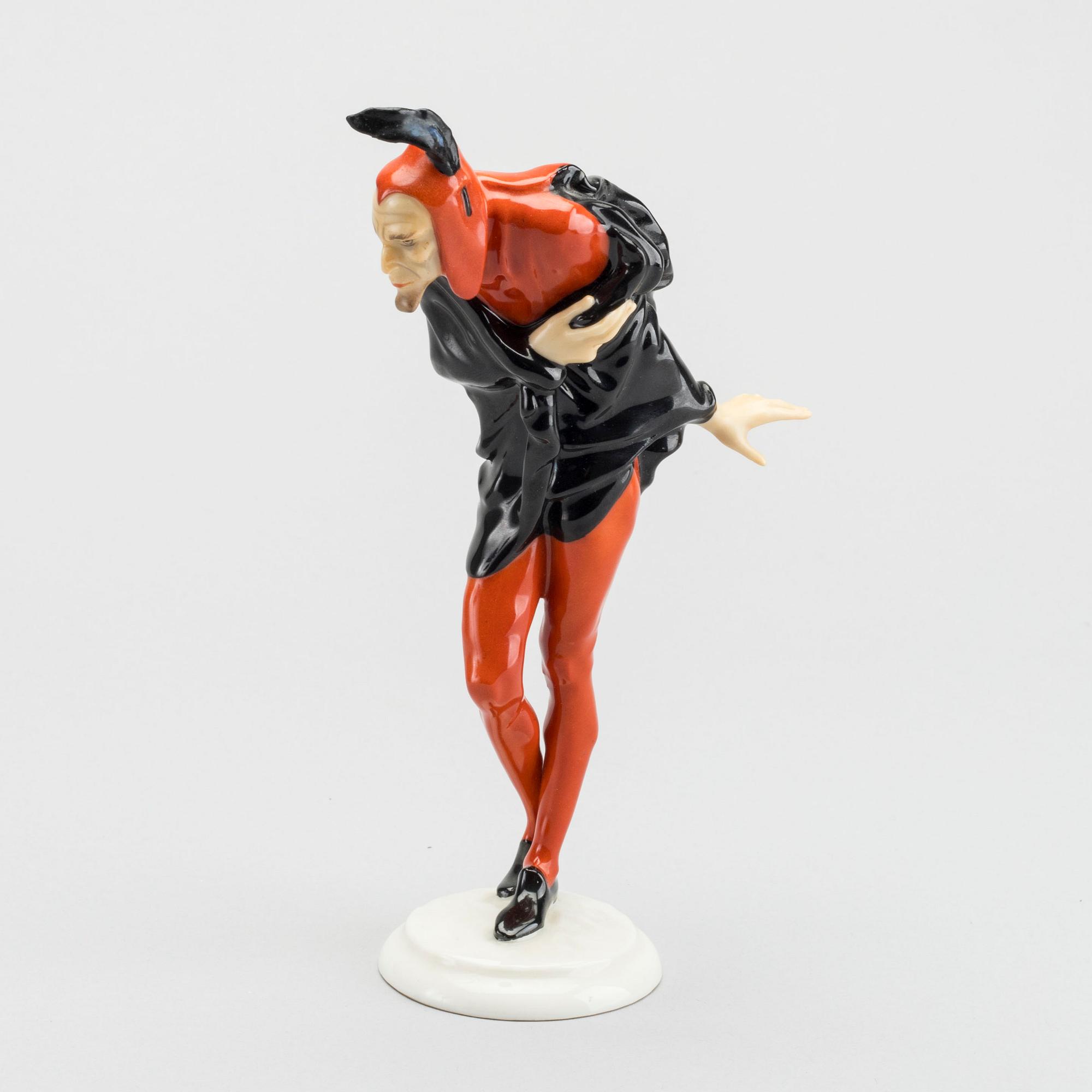 KARL TUTTER,  a signed porcelain figurine.