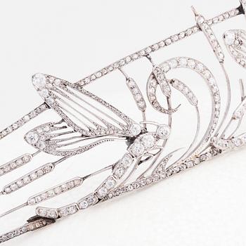 An important Boucheron dragonfly tiara, 1909, platinum set with diamonds.