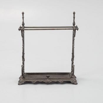 A cast iron umbrella stand, early 20th century.