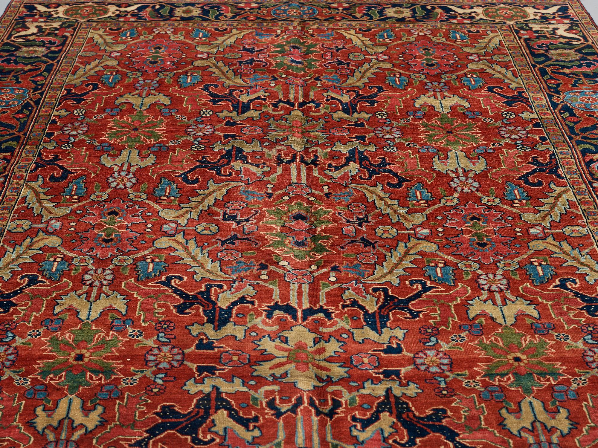 A CARPET, a semi-antique Heriz, ca 322-327 x 226,5 cm.