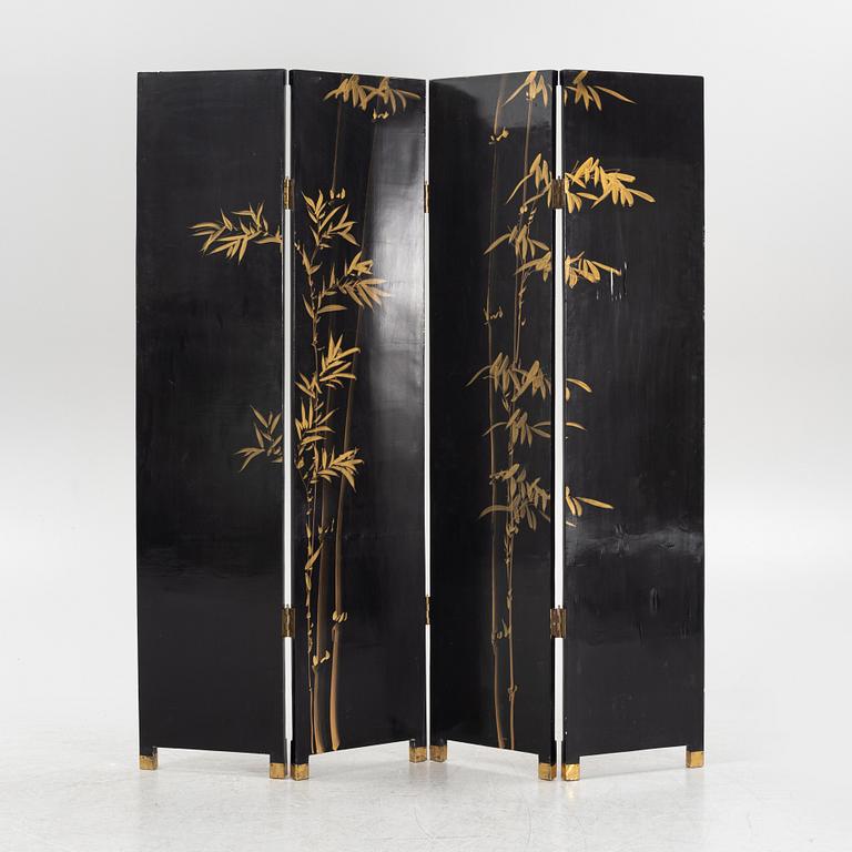 A Chinese lacquer folding screen, 20th century.
