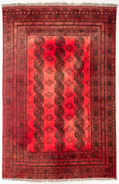 A semaintique Afghan carpet ca 390x300 cm.