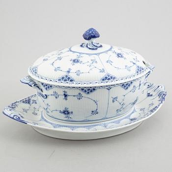 A 'Blue fluted half lace' / 'Musselmalet' porcelain tureen with cover and stand, Royal Copenhagen, model 595, 598, 1947.