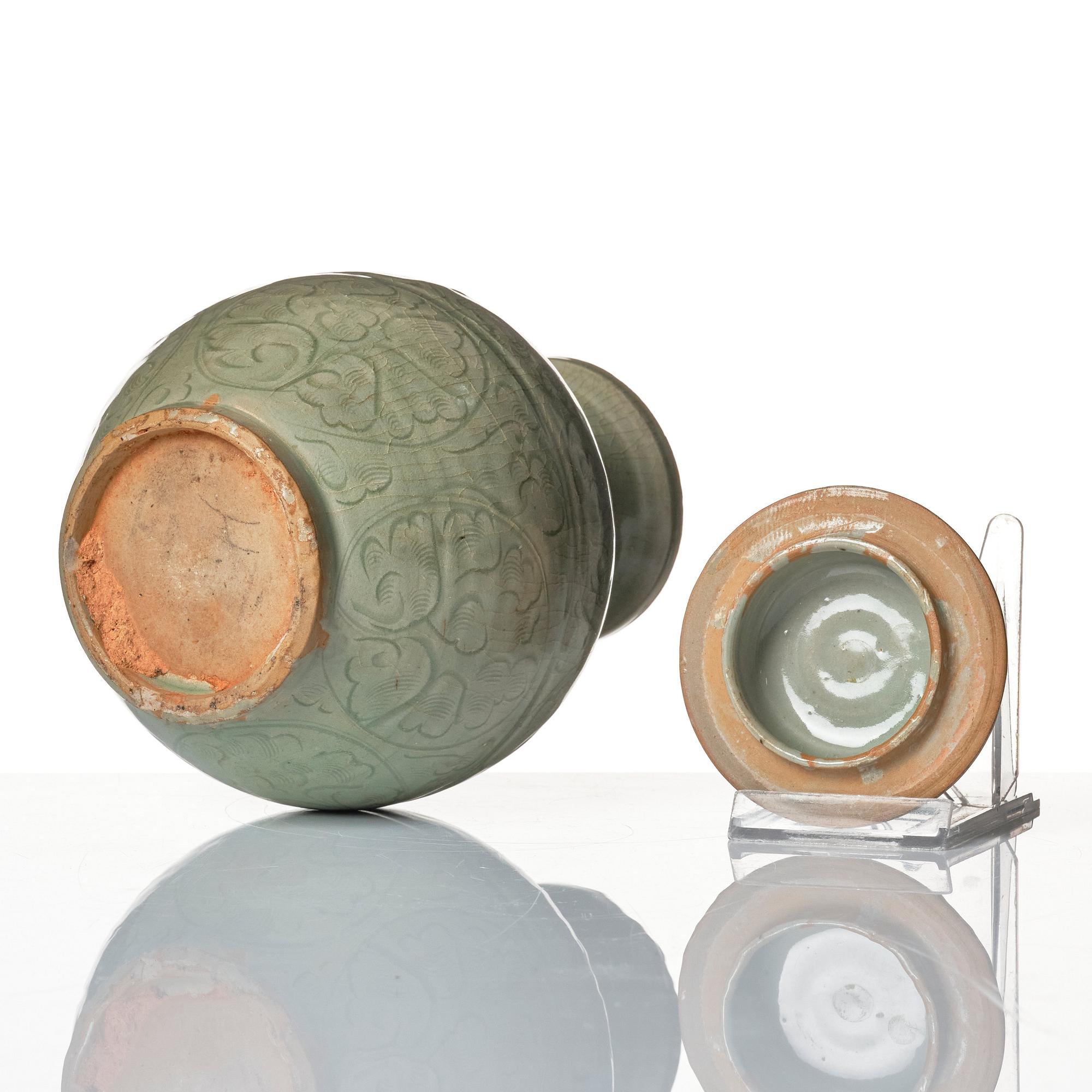 A celadon glazed jar with cover, Yuan dynasty (1271-1368).