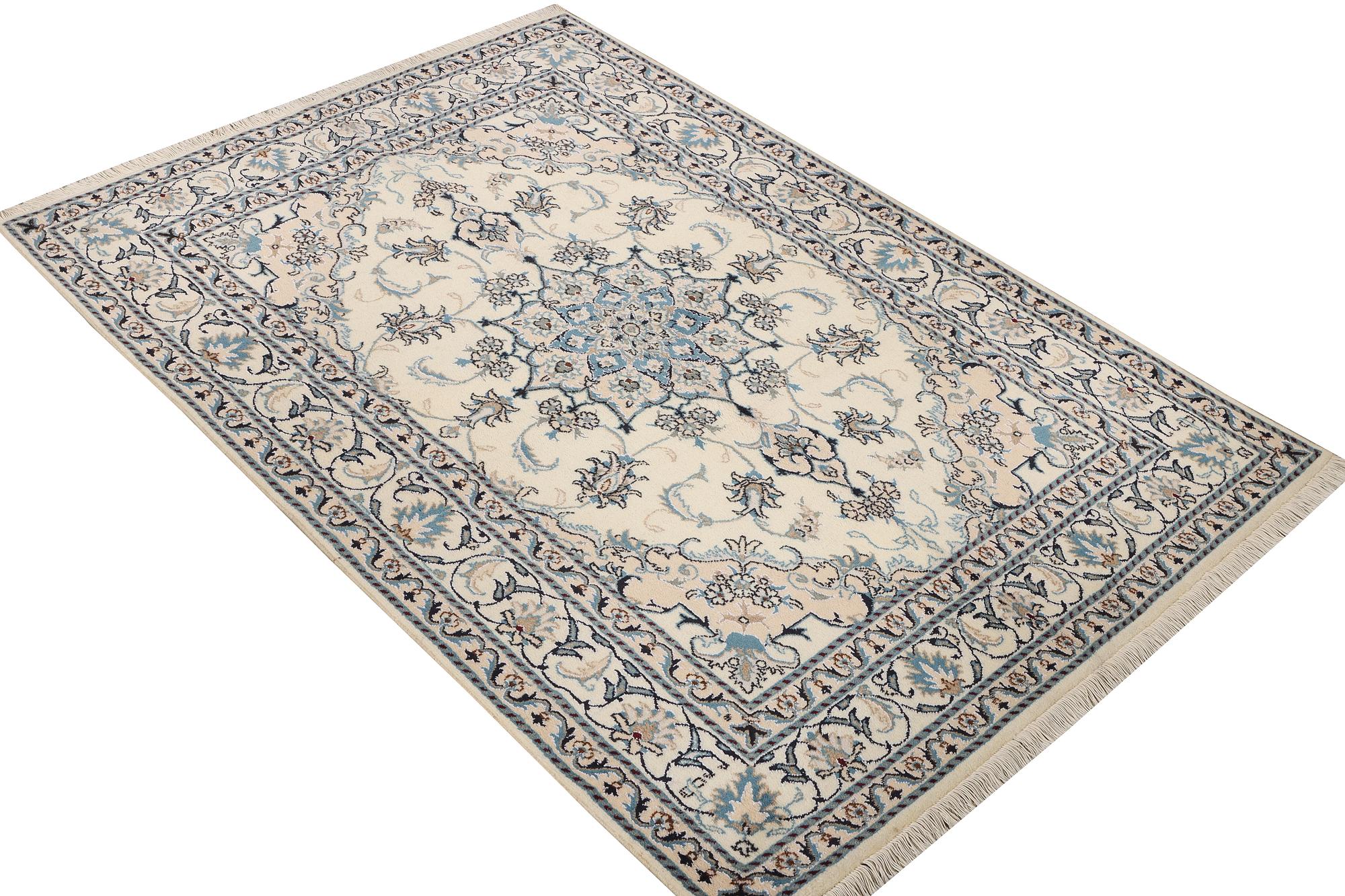 A Nain part silk rug, c. 193 x 148 cm.