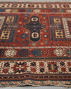 A CARPET, an antique Shirvan, Czar Russia, ca 277-288,5 x 139-140 cm (as well as 1 cm flat weave at the ends).