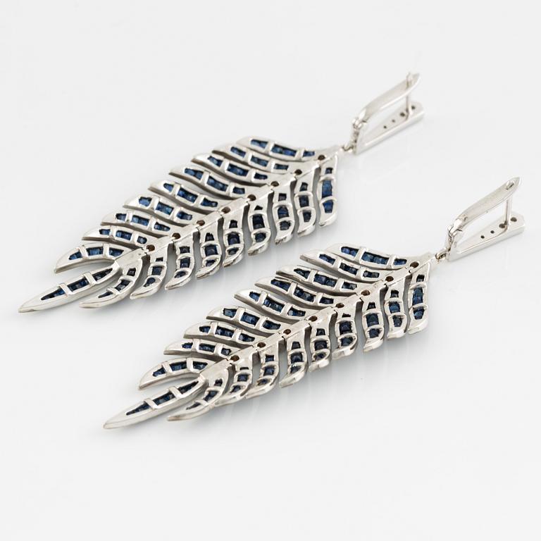 Sapphire and brilliant cut diamond feather earrings.