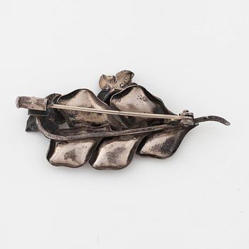 A brooch and a pair of earrings by Georg Kaplan, Stockholm.