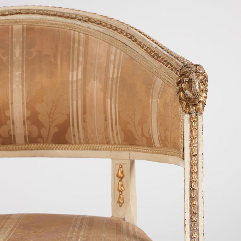 A late Gustavian carved and part-gilt open armchair, late 18th century.