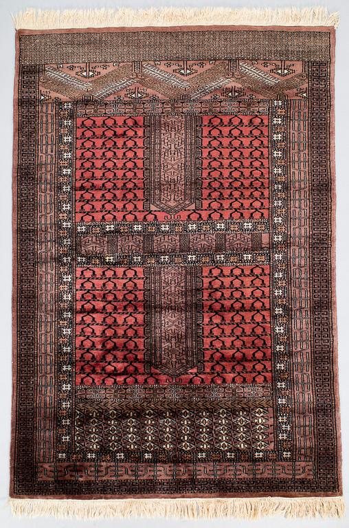 An Afghan rug, circa 180 x 127 cm.