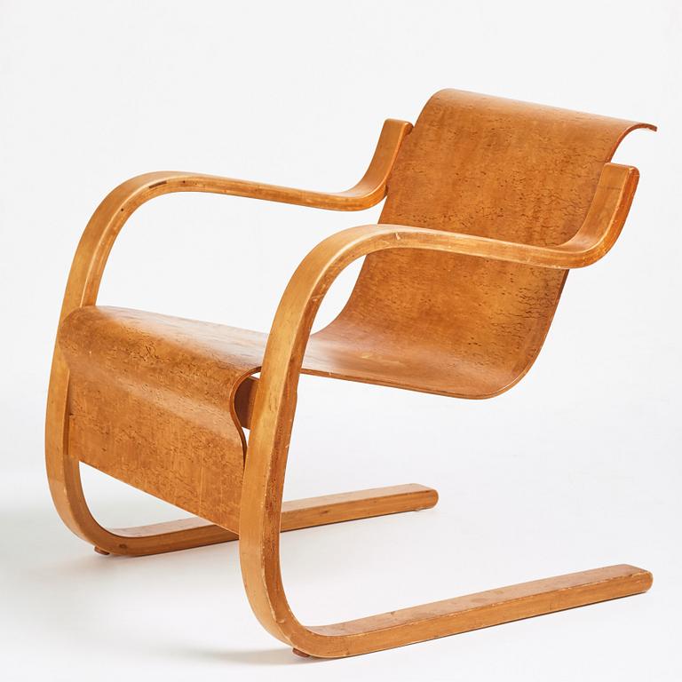 Alvar Aalto, a model nr 31 birch armchair, executed on license by Aalto Design Hedemora, Sweden 1945-54.