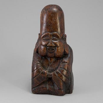 A wooden scultpure of a lohan, China, 20th Century.