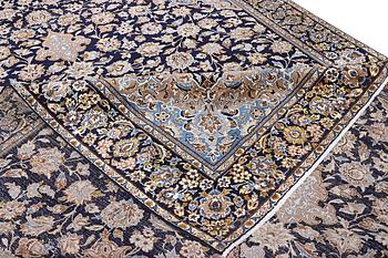A Kashan carpet, c. 430 x 293 cm.