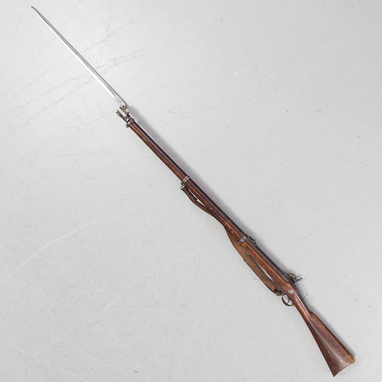 A Swedish 19h Century percussion rifle made by Carl Gustaf stads gevärsfaktori, dated 1851. With bayonet.