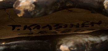 A Ceramic Figurine, signed T Kaasinen Arabia Finland.