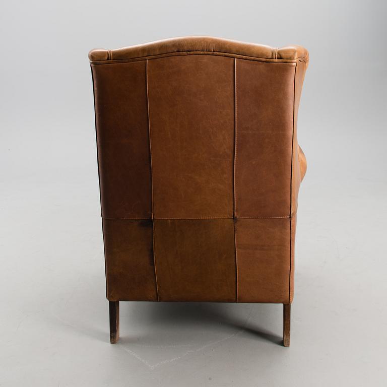 A late 20th century wing chair.