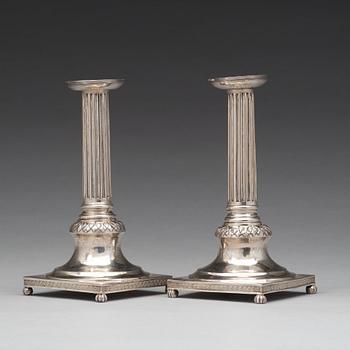 A pair of Swedish early 19th century silver candlesticks, mark of Anders Fornholm, Stockholm 1801.