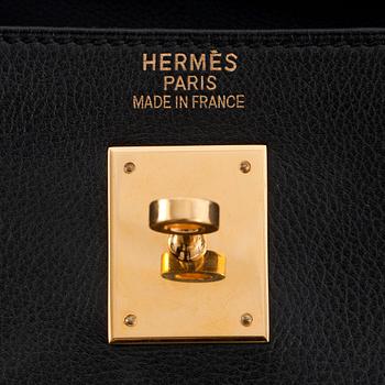 HERMÈS, a black calf leather handbag, "Kelly 35".