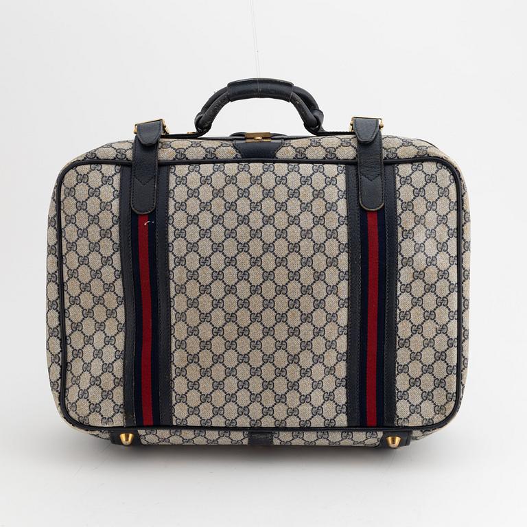 Gucci, resväska.