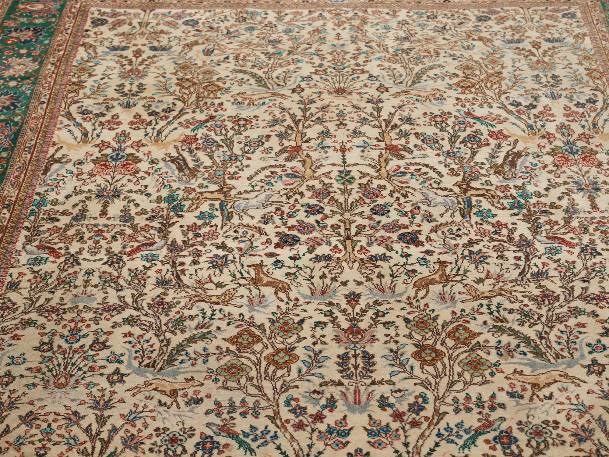 A carpet, semi-antique Tabriz figural, ca 256,5 x 205 cm.