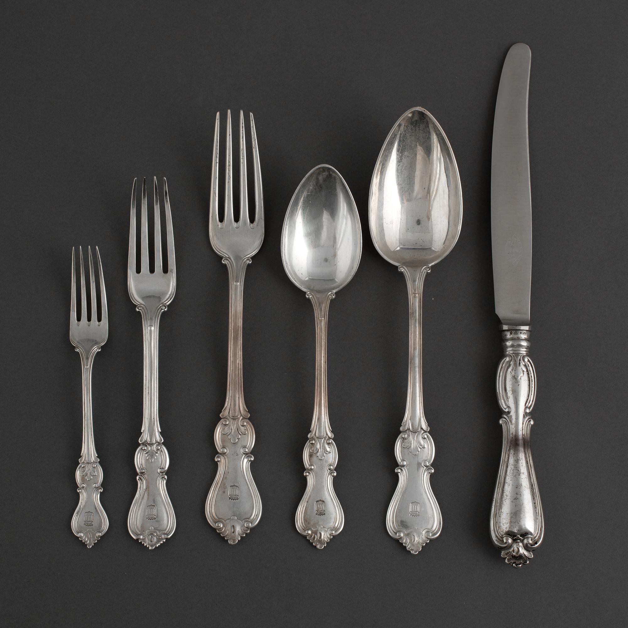 A set of 59 pieces Swedish silver flatware model "Olga", by CG Hallberg, Stockholm, early 20th century.