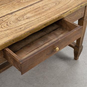 A French oak dining table, 20th Century.