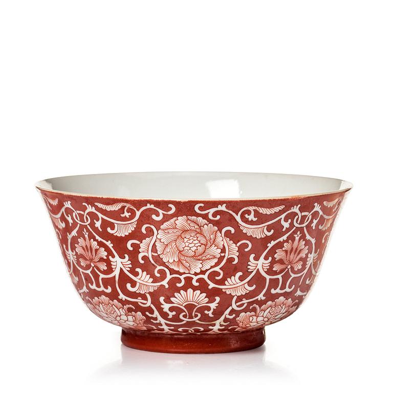 A coral red reverse decorated floral bowl, seal mark of Daoguang, Republic, 20th Century.