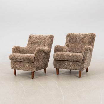 Armchairs, a pair from the 1940s.