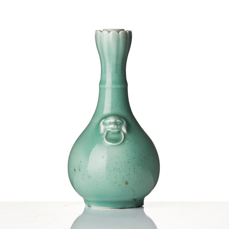 A celadon glazed vas, late Qing dynasty, with Yongzheng mark.