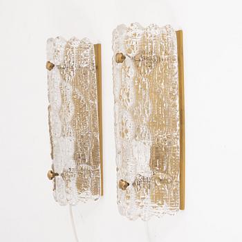 Carl Fagerlund, a pair of brass and glass wall lights, Orrefors, 1960's.