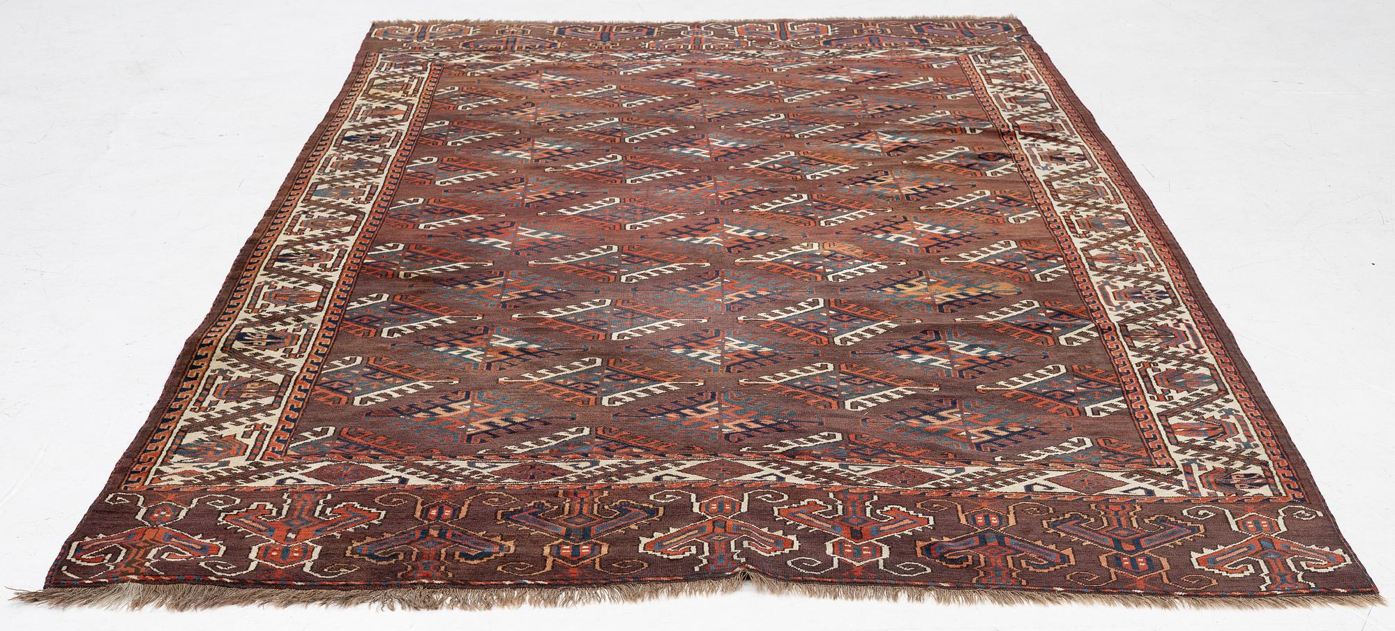 An antique Yomut main carpet, West Turkmenistan, c. 303 x 179 cm.