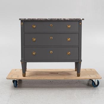 A Gustavian style chest of drawers, mid 20th Century.