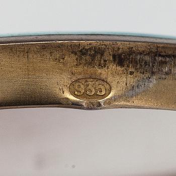 Halsband, medaljong med spegel, silver och emalj. Importstämplad I Erling, Helsingfors tidigt 1900-tal.