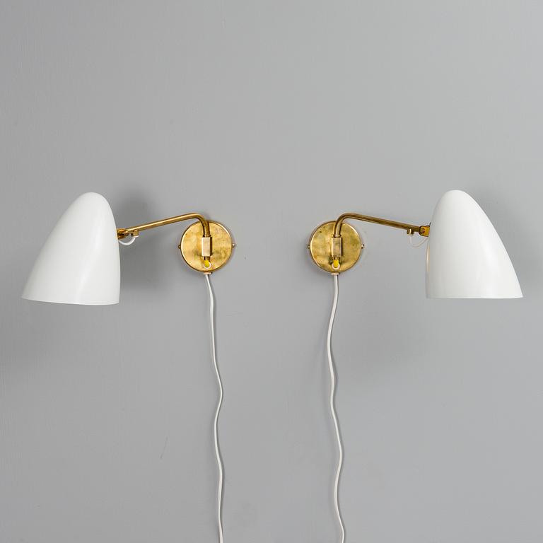 PAAVO TYNELL, A PAIR OF WALL LIGHTS. Manufacturer's stamp Idman. 1950s.