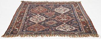 An antique rug, Shiraz, ca. 180 x 155 cm.